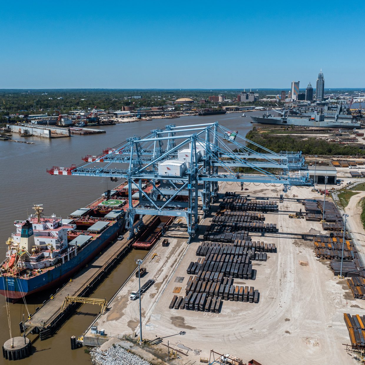 Barge-mounted heavy lift crane, Heavy lift crane, Super post Panamax crane, Post Panamax crane, Mobile Container Terminal, APMT, McDuffie Coal Terminal, Metallurgical coal, Alabama Steel Terminal, Connectivity , Rail Access, On dock cold storage, Cold storage facilities, Real estate, Commercial development, Mobile River, Mobile Bay, Rail Ferry